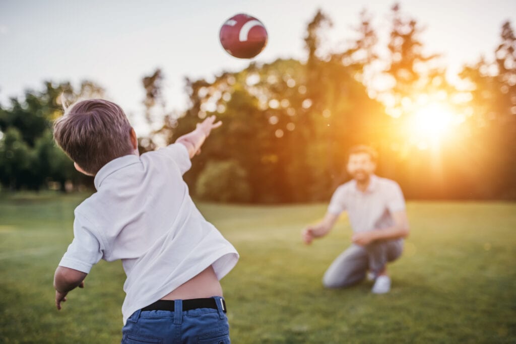 football-dad-son-sunshine-ball-american-park-place-finance