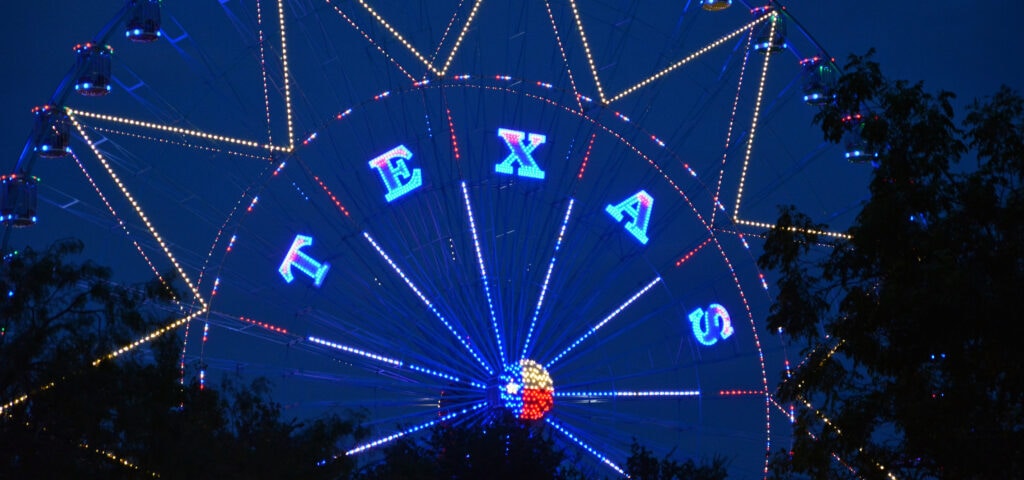 texas-housing-markets-bounce-back-ferris-wheel-lights-park-place-finance