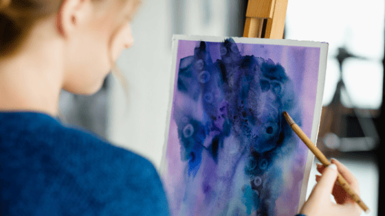 Woman-painting-blue-picture